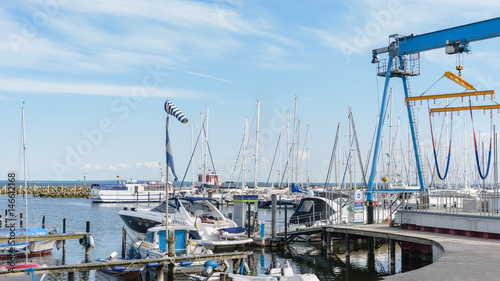 Ssailing yachts at a port of Baltic Sea. Yacht hoist. Northern Germany, coast of Baltic Sea