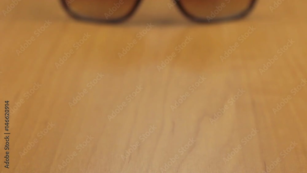 Dolly shot. Close-up womens stylish sunglasses. Dolly shot. Close-up womens stylish sunglasses.
