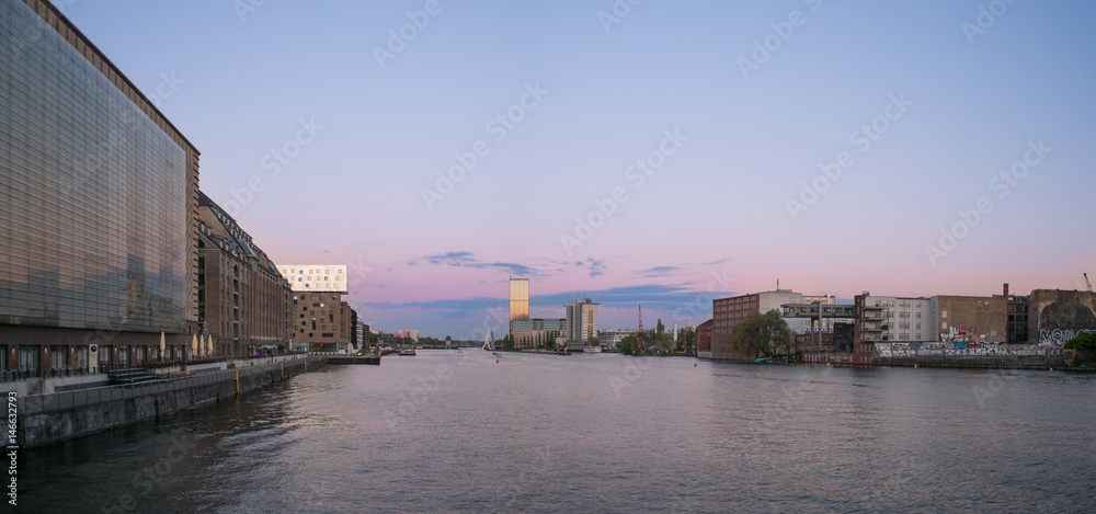 Fototapeta premium Berlin skyline - river spree panorama, sunset sky