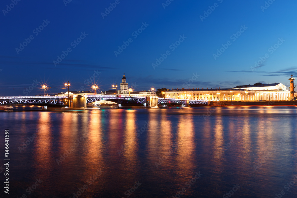 Palace bridge in Saint Petersburg, Russia at night. Illumination and lights, dark blue sky