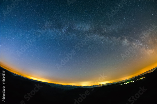 Astro Landscape with the Milky Way as seen from the Luitpold Tower in the Palatinate Forest in Germany. photo