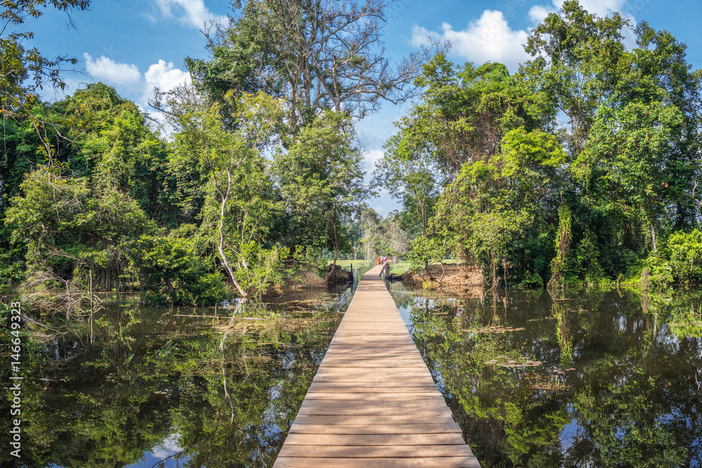 The path towards to Neak Pean temple on artificial island. Siem Reap, Cambodia