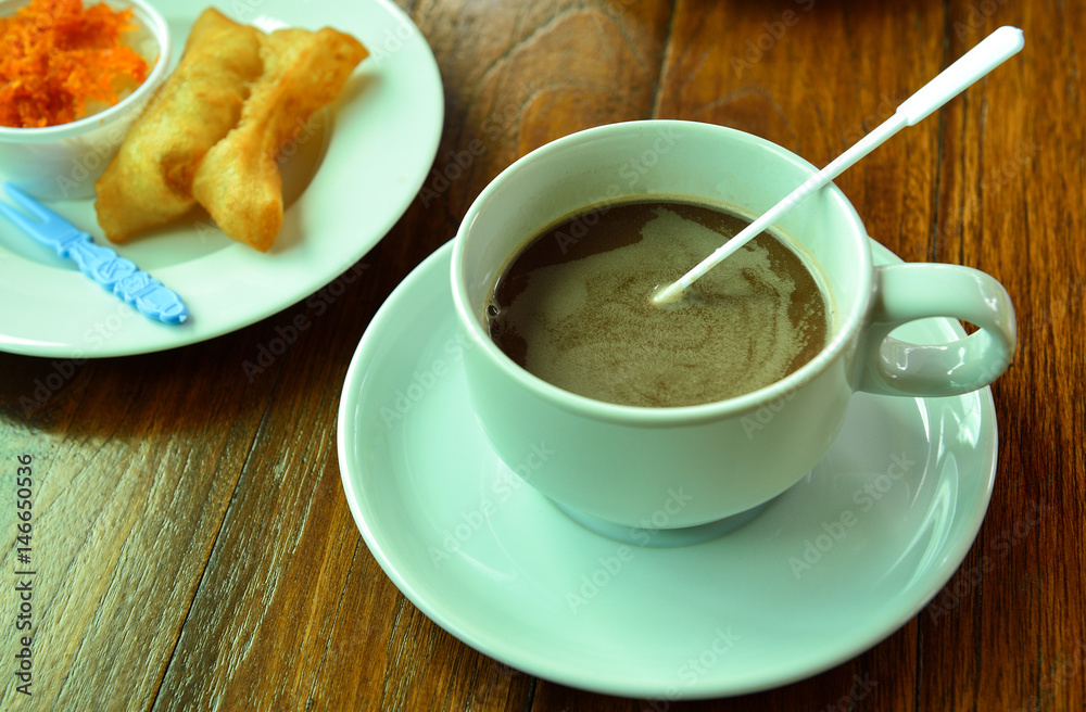 hot cocoa cup on wooden background hot cocoa cup on wooden background