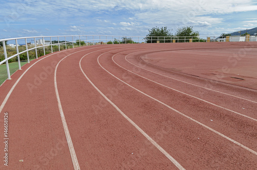 red running track with white lines © chok1234567