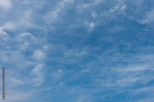 Fototapeta Naklejka Na Ścianę i Meble -  Blue sky with translucent watercolor-like clouds at daytime
