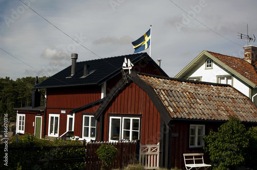 Svensk flagga på hus