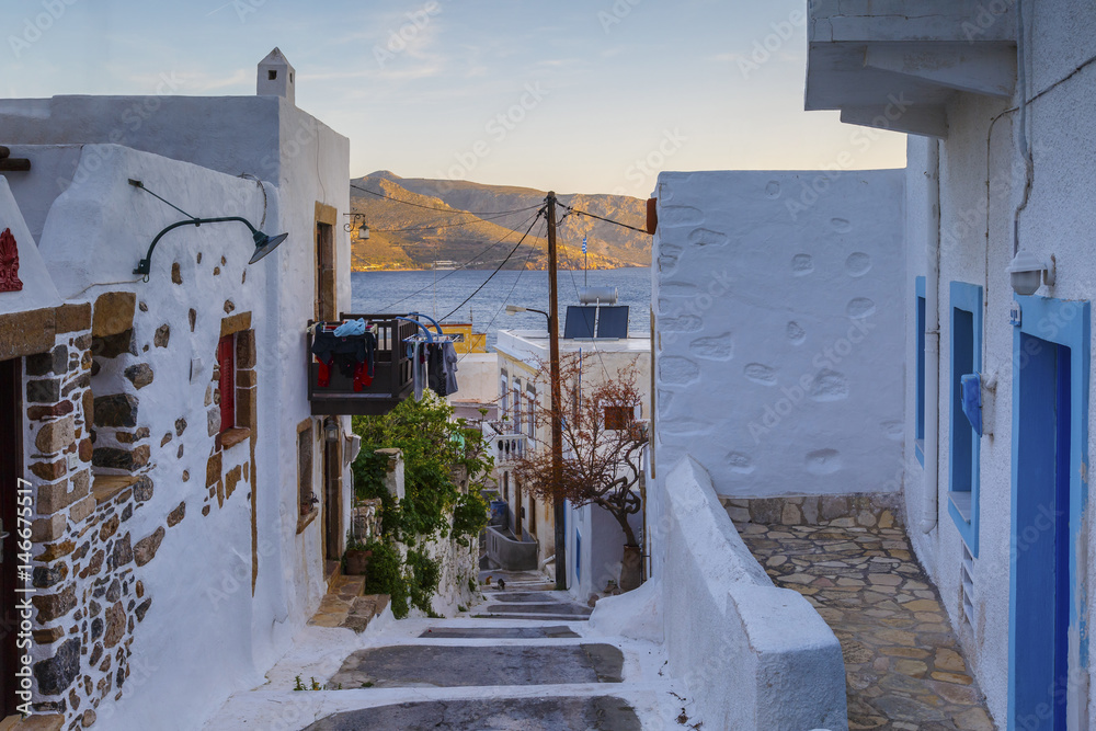 Street in Agia Marina village on Leros island in Greece early in the morning. 
