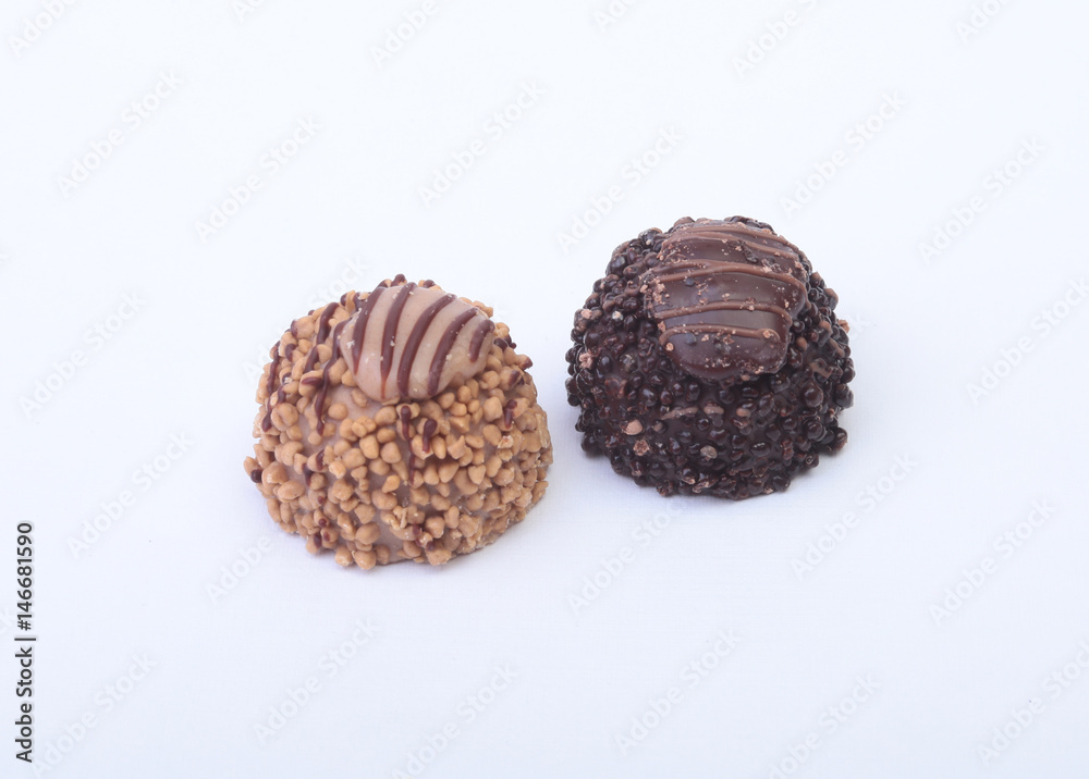 delicacy handmade chocolate pralines isolated on white background