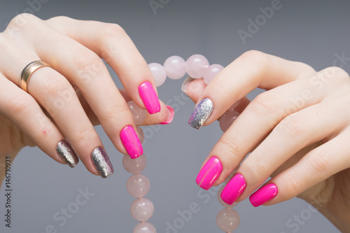 Attractive women's hands. Natural nails with beautiful manicure.