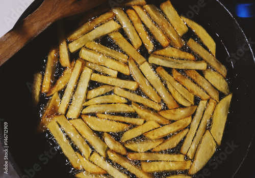 potatoes fries in a pan photo