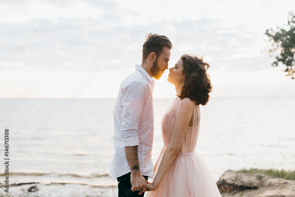 Beautiful wedding couple near the sea Beautiful wedding couple near the sea