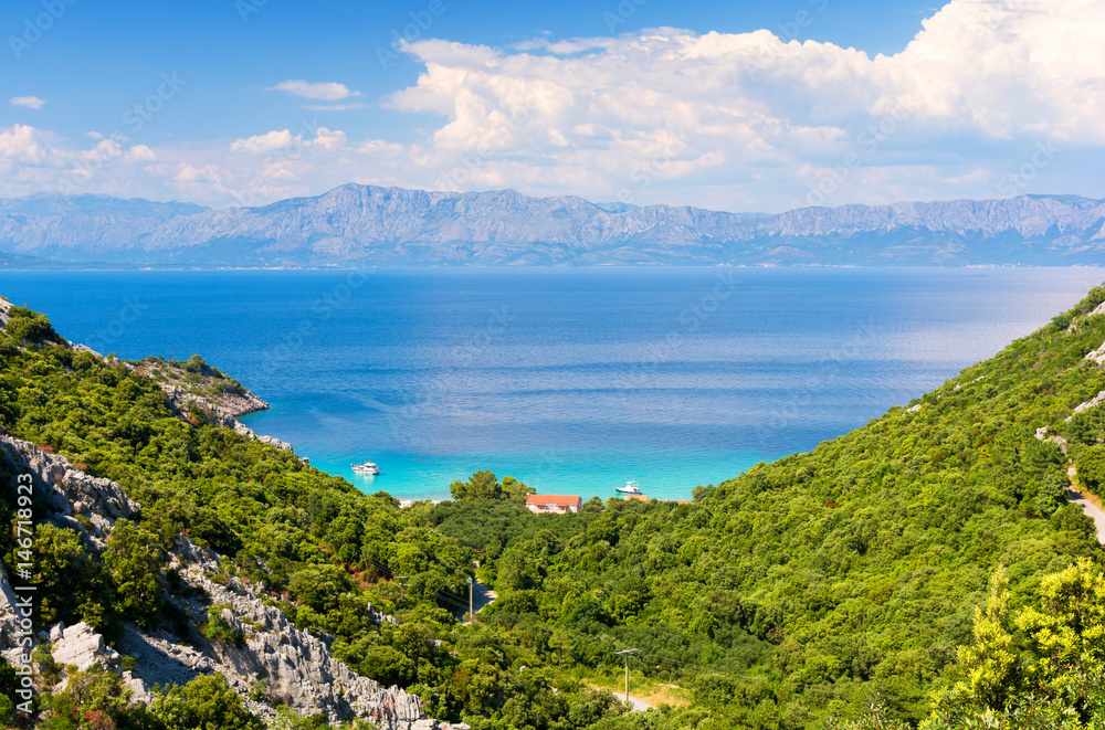 view on azure bay and Biokovo mountains from Peljesac peninsula, Dalmatia, Croatia
