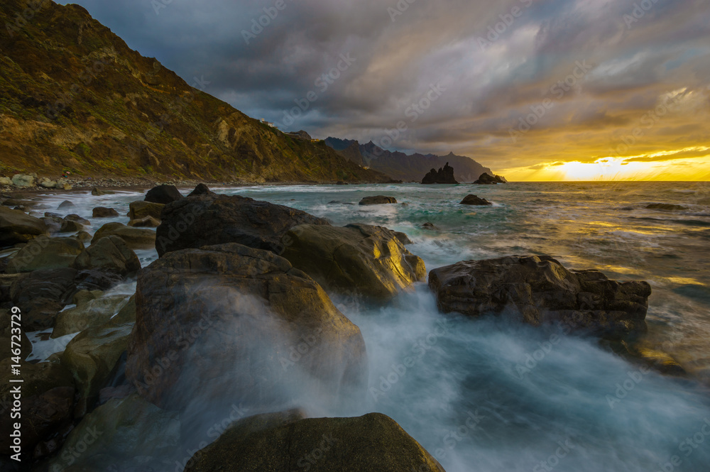 Dynamic and dramatic sunset over Benijo beach in Tenerife