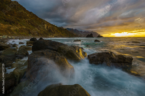 Dynamic and dramatic sunset over Benijo beach in Tenerife
