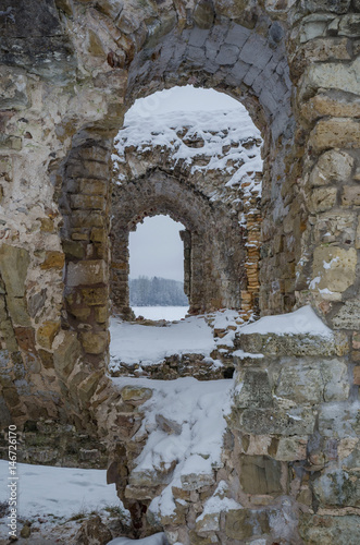 Winter landmark. Snow covered ancient fortress walls.