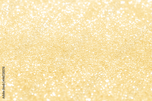 Gold abstract background with bokeh.