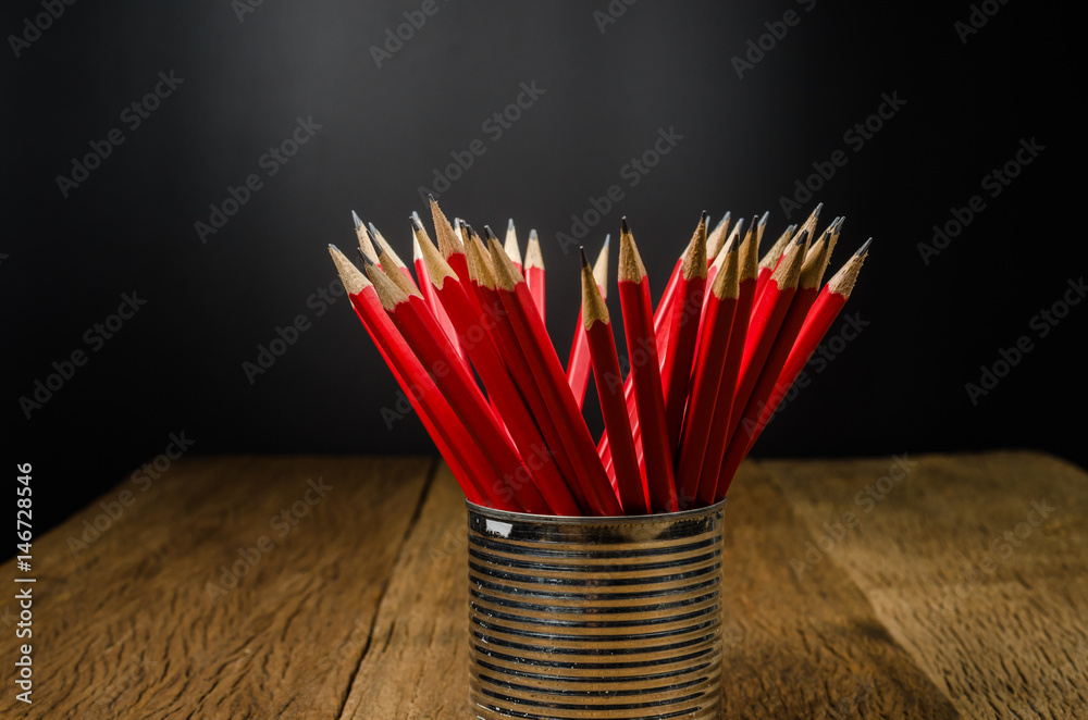 wooden pencil in tin can