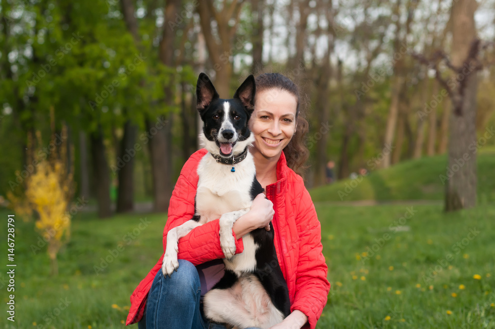 Woman and mixed breed dog portrait Woman and mixed breed dog portrait