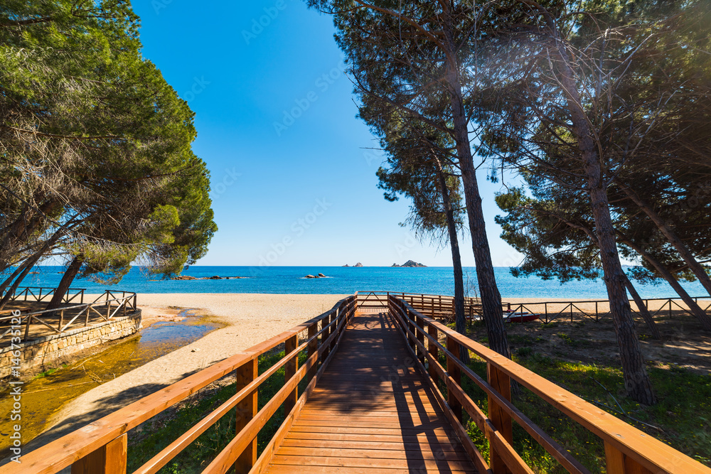 Fototapeta premium Wooden boardwalk in Santa Maria Navarrese