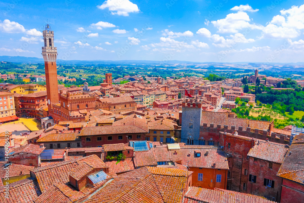Aerial view over the historical medieval  buildings  in the old town of Siena, Italy