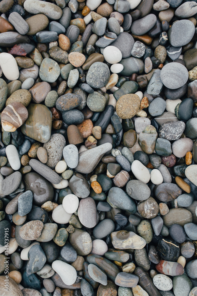 Sandy Beach. The texture of the stones Sandy Beach. The texture of the stones