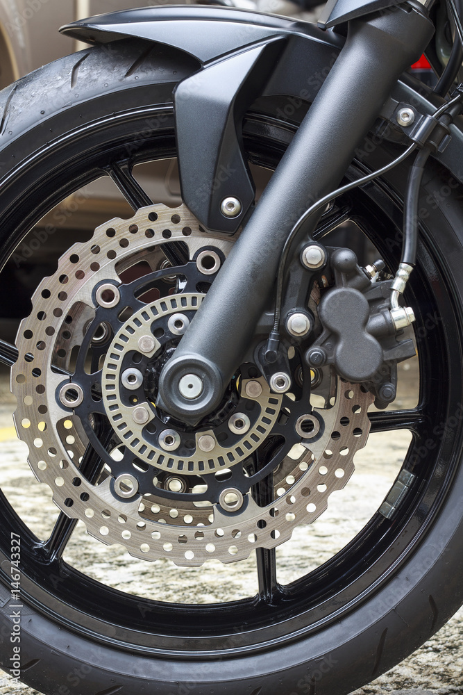 Front disk brake of modern motorbike.