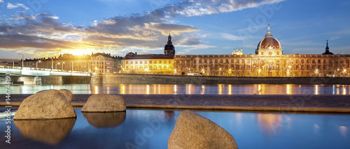 View from Rhone river in Lyon city at sunset photo