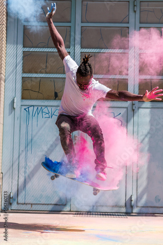 Skating Skater Skateboard with Holi Powder photo