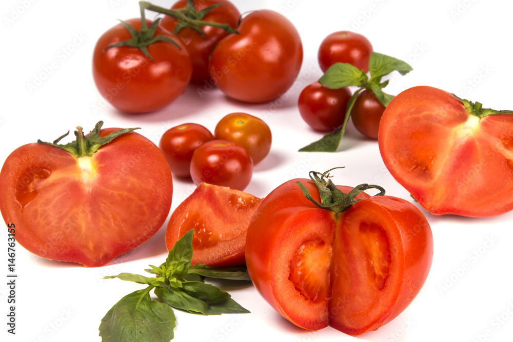 Fototapeta premium Red tomatoes on a white background, isolated