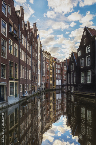 The canal houses along the junction of the canals Oudezijds Voorburgwal and Oudezijds Achterburgwal photo