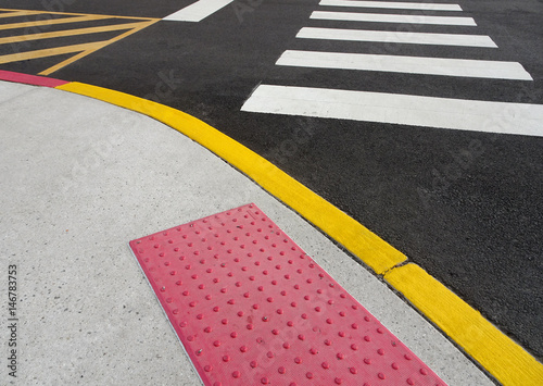 painted curb and crosswalk markings