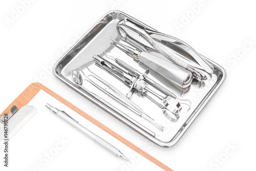 Dental tools, equipment and dental chart on white background
