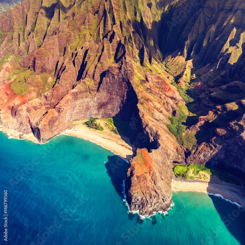 Hawaii Na Pali coast in Kaui, Hawaii. Aerial view of Honopu arch and beach on Kauai island. © Maridav