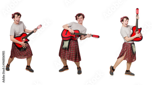 Scotsman playing guitar isolated on white