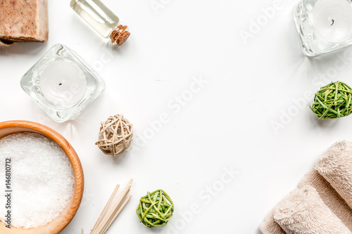spa cosmetics with soap, salt, oil top view space for text