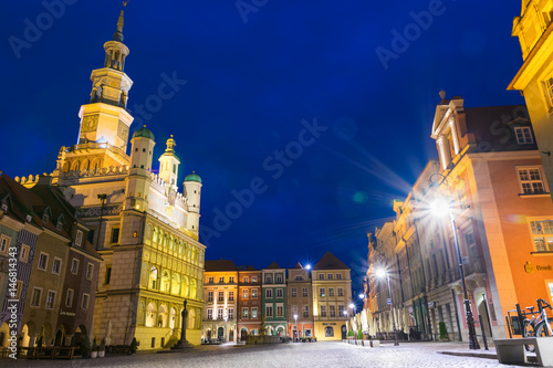 Beautifully illuminated Poznan s  Old Town with  historic city hall.