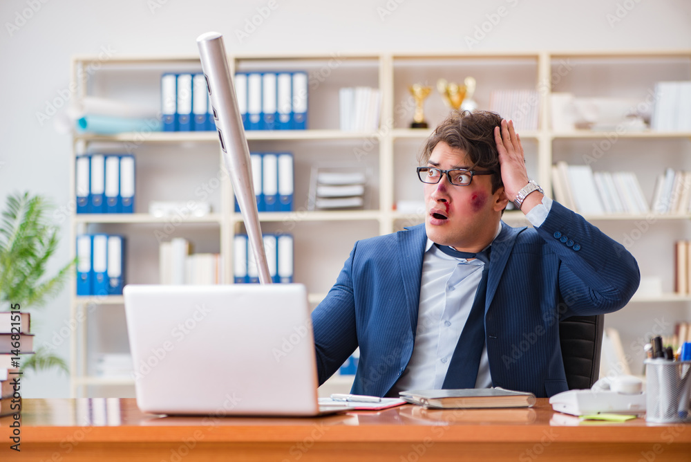 Angry aggressive businessman in the office
