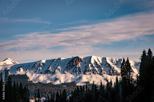 alpine sunrise on snowcapped peaks