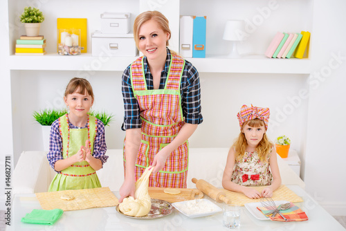 three hostesses cook photo