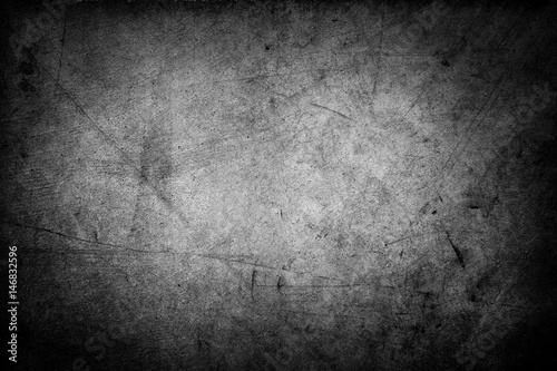 Grunge black concrete texture wall background. Dark edges