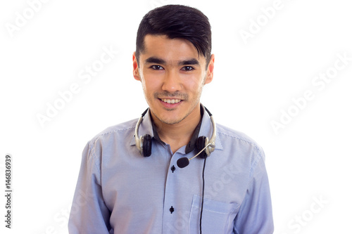 Young man using headphones  photo