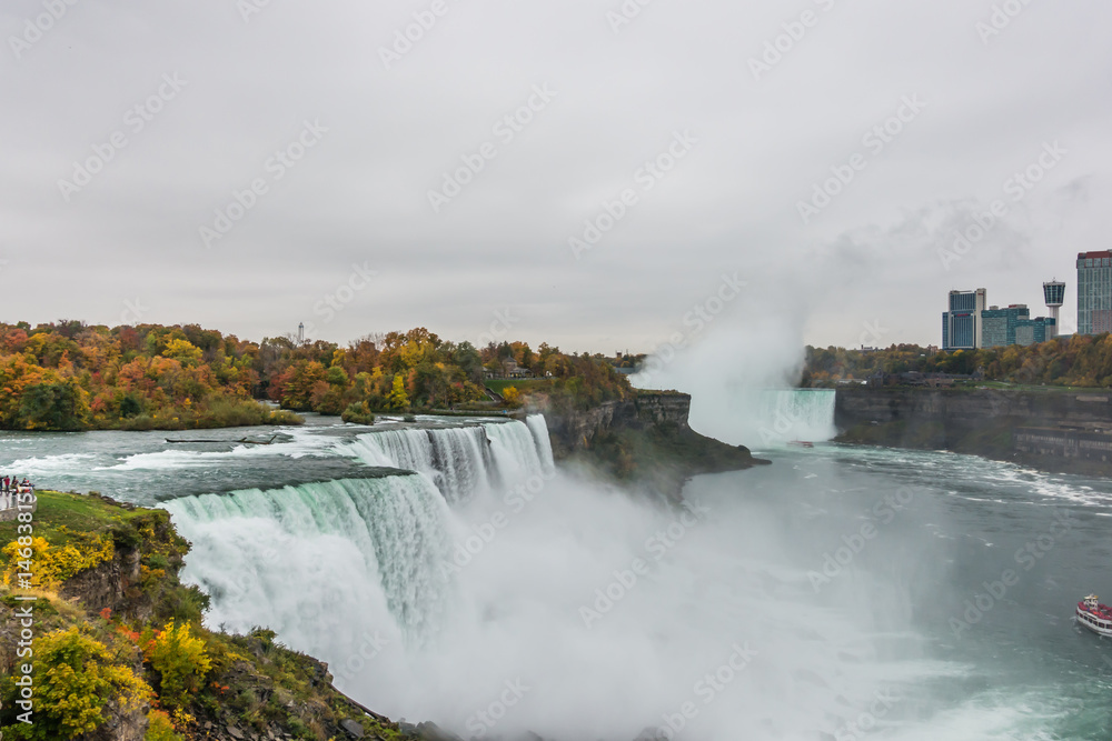 American side of Niagara Falls during sunrise . American side of Niagara Falls during sunrise .