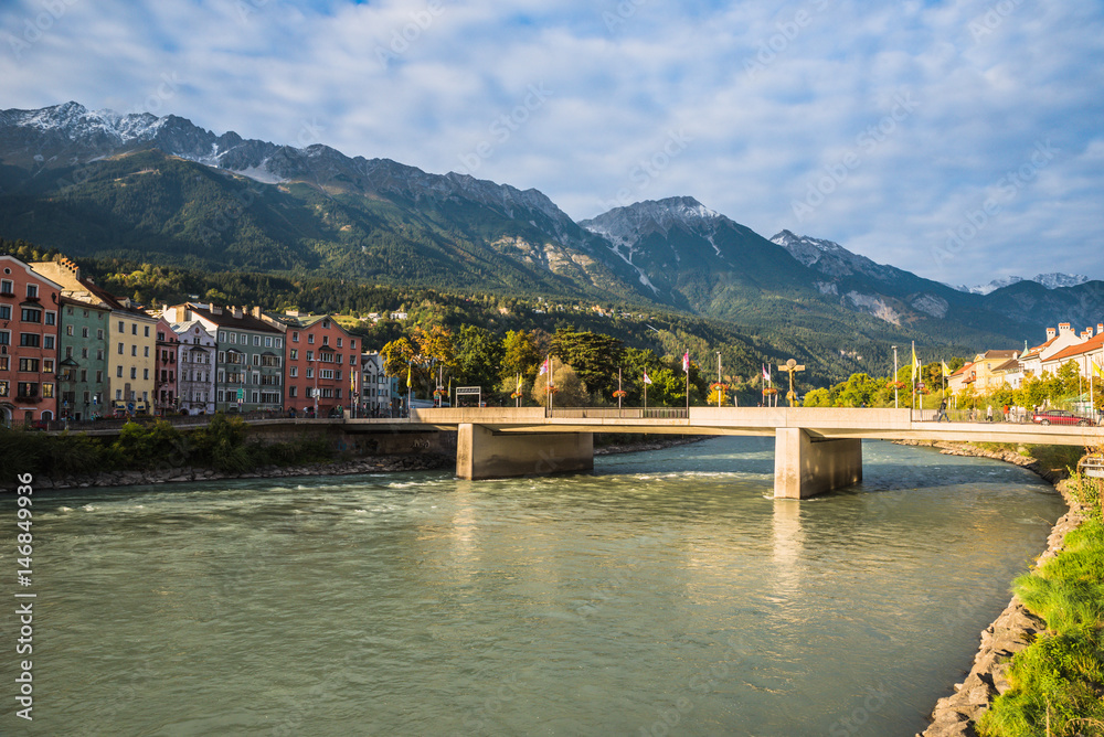 Bridge at River Inn in beautiful mountain scenery at City Innsbruck, Austria Bridge at River Inn in beautiful mountain scenery at City Innsbruck, Austria