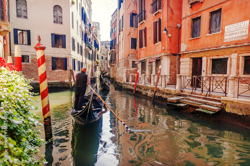 Gondola in the canals of venice © dimbar76