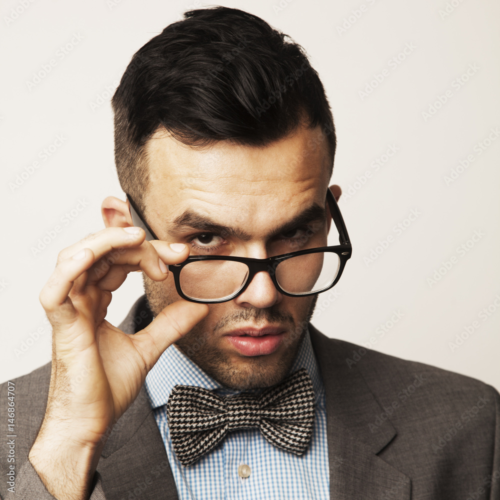 Portrait of a young businessman in glasses (Success, competition, perspective concept) Portrait of a young businessman in glasses (Success, competition, perspective concept)