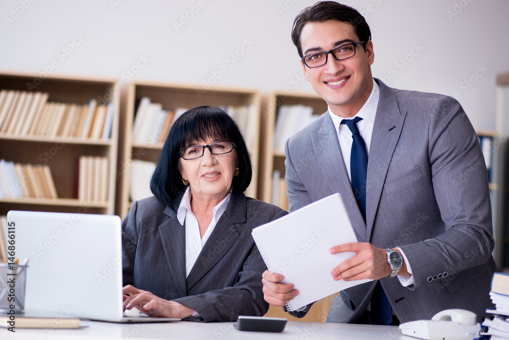 Business couple having discussion in the office Business couple having discussion in the office