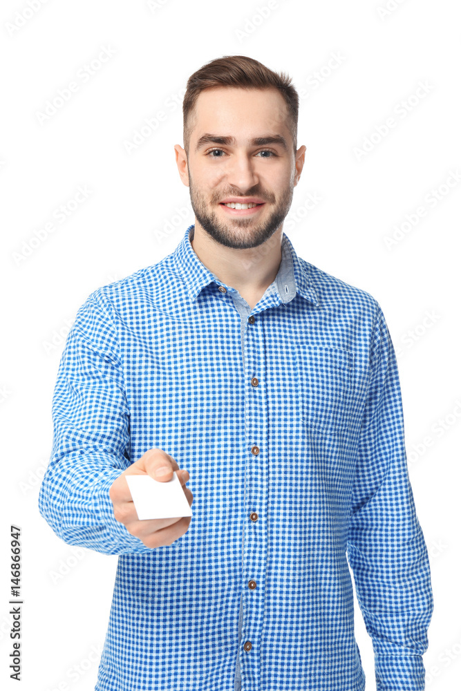 Handsome young man with business card on white background Handsome young man with business card on white background