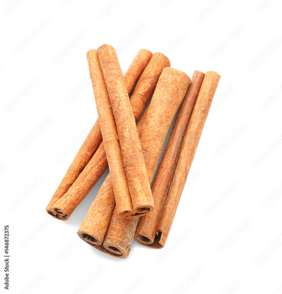 Heap of cinnamon sticks on white background Heap of cinnamon sticks on white background