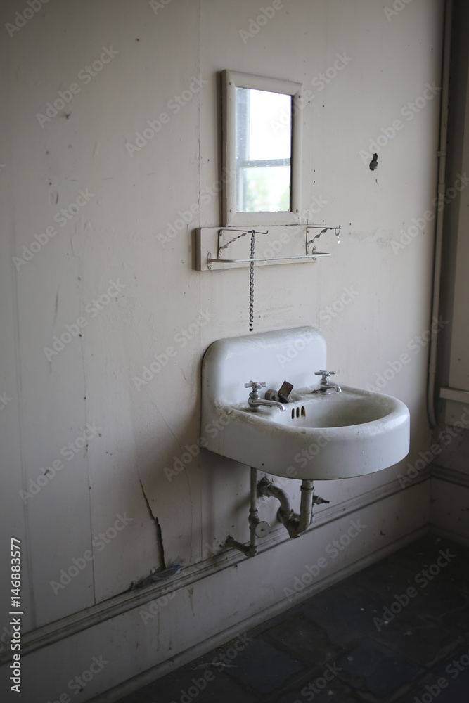 Bathroom Sink in an Abandoned 1920s Hotel Bathroom Sink in an Abandoned 1920s Hotel