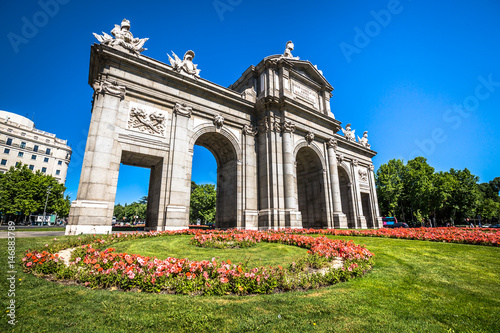 Alcala Gate (Puerta de Alcala) - Monument in the Independence Square in Madrid, Spain photo